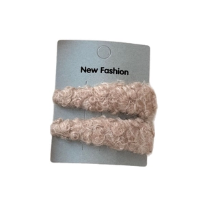 Pair of Korean-style fuzzy lamb wool triangle BB hair clips in a soft beige cream color