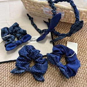 Blue bow hair accessory set with plaid and polka dot patterns for girls hair styling