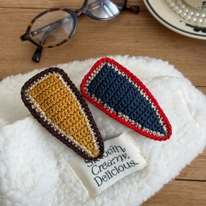 Handmade crochet BB hair clips in contrasting yellow and navy colors for autumn winter