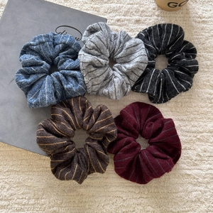 Five-piece set of striped knit hair scrunchies in deep navy, grey, black, brown and burgundy
