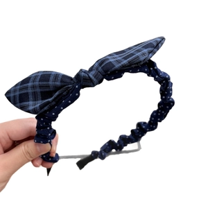 Deep blue bow headband with plaid and polka dot fabric for school style hair styling
