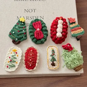 Handmade crochet Christmas hair clips set with festive tree and wreath designs