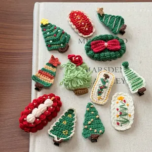 Handmade crochet Christmas hair clips set with festive tree and wreath designs