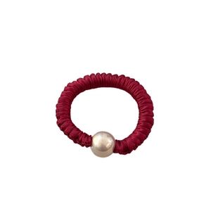 Elegant deep red satin hair scrunchie with a single champagne pearl bead for women