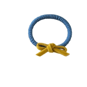 Blue braided elastic hair tie with a soft mustard yellow velvet bow accessory for women