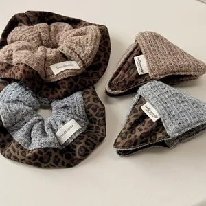 Knitted leopard print scrunchies and hair clips set in grey and coffee brown colors