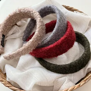 Plush fleece headbands in neutral colors with handmade label for high cranial top hair look
