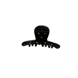 Black acetate hair claw clip with colorful rhinestones on a white background
