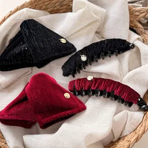 Vintage velvet banana clips and bow hair claws in black and wine red with gold labels