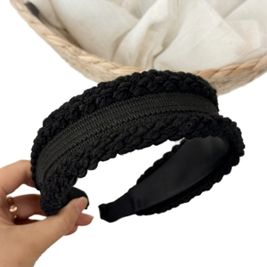 Handmade black knit twist headband with thick textured crochet pattern for women