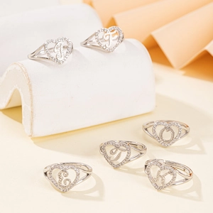 Fashionable crystal heart open ring with 26 letters in polished silver finish