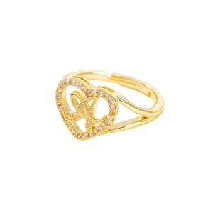 Adjustable gold heart ring with pavé crystals and letter A cutout on white background