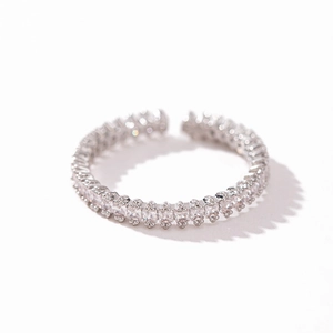 Detail view of silver adjustable open ring featuring rectangular clear zircon pavé stones