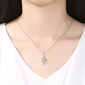 Elegant angel wing pendant necklace with cubic zirconia on a minimalist silver chain