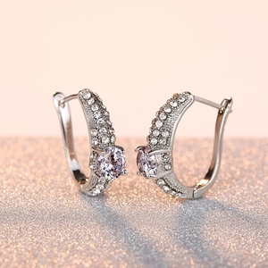 Luxuriöse silberne Huggie-Ohrringe mit Zirkonsteinen und Pavé-Kristallbesatz für Damen