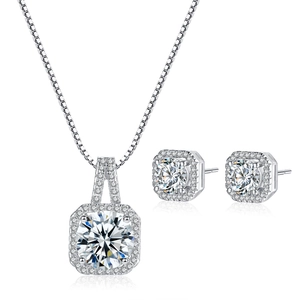 Macro shot of square halo jewelry set with round brilliant cut zircon and silver finish