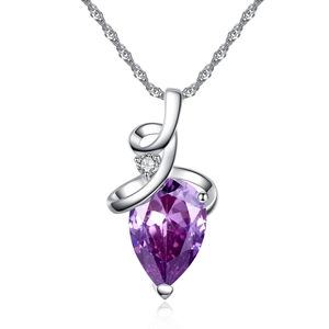 Macro shot of the pear-cut purple amethyst pendant with a silver spiral setting and fine chain
