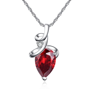 Silver twist necklace with a pear-cut red gemstone pendant on a white background