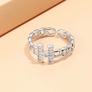 Silver H-letter open ring with zircon stones and link chain design in a 45-degree view