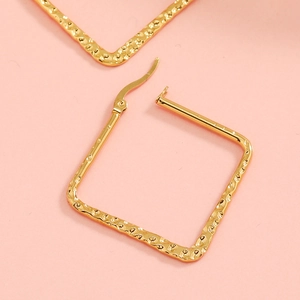 Golden square hoop earrings with hammered texture finish for a modern geometric look