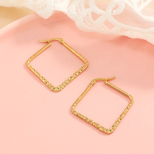 Square hammered gold earrings with textured metallic finish and secure latch-back closure
