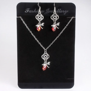 Silbernes Libellen Schmuckset mit keltischem Knoten und roten Kristallanhängern