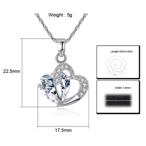 Detail view of silver heart pendant necklace with dimensions 22.5mm height and 17.5mm width