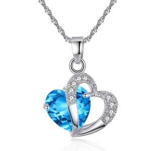 Elegant heart-shaped necklace with blue crystal and white rhinestones on silver chain