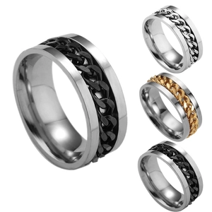 Detailed close-up showing rotating chain rings in silver, black and gold finishes