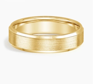 Detail view of 8mm gold stainless steel ring with brushed surface and polished edges