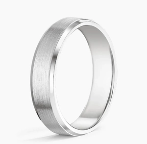 Detail of 8mm matte stainless steel ring with brushed surface and polished beveled edges