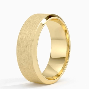 Close-up of 8mm golden matte stainless steel ring with brushed surface and polished edges
