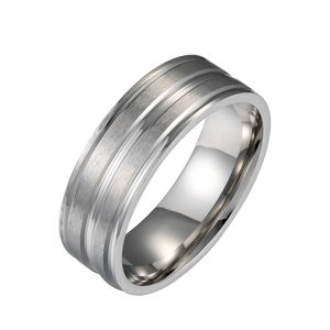 Detail of men's matte titanium steel ring with brushed center and polished edges
