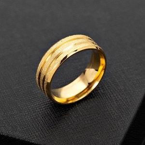 Frosted gold plated stainless steel ring with double groove design on black jewelry box