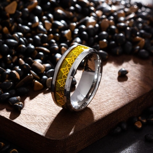 Detailed close-up of Freemason symbol engraved on a gold glitter inlay stainless steel ring