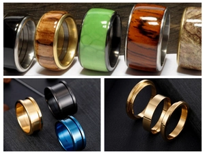 Macro detail of various DIY handmade rings in wood inlay, green resin, and polished steel