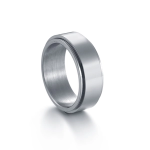Minimalist silver spinner ring for men made of polished stainless steel for stress relief