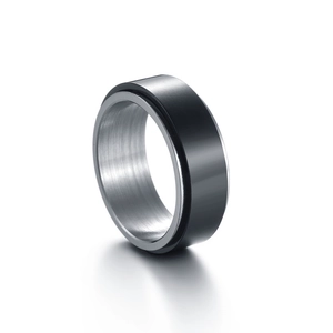 Men's two-tone rotating spinner ring in matte black and brushed silver stainless steel