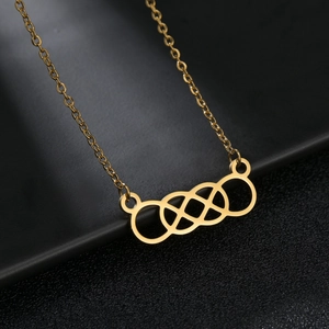 Polished gold interlocking circles necklace on black leather pendant display