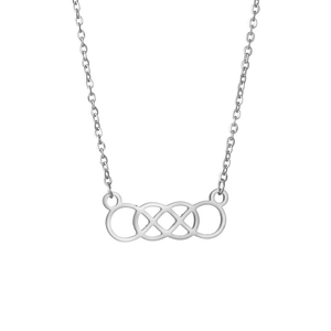 Macro shot of polished silver concentric knot pendant with geometric hollow design