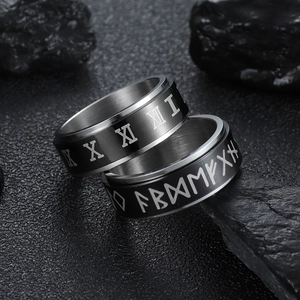 Rotatable stainless steel ring with black Roman numerals and Nordic Viking runic symbols