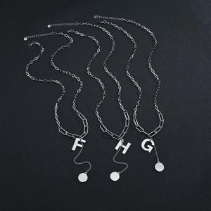 Hip hop titanium steel necklace featuring letter pendants with paperclip chain design