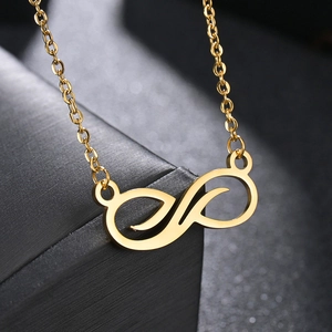Gold infinity leaf pendant necklace in polished titanium steel with classic O-chain