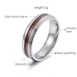 Detail of 6mm stainless steel ring featuring handcrafted solid wood inlay and polished finish