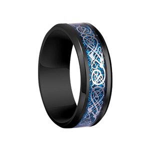 Detail view of black stainless steel ring with blue inlay and silver Celtic dragon pattern