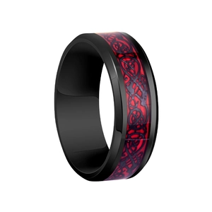 Close-up of black and red dragon pattern inlay on wide stainless steel ring band