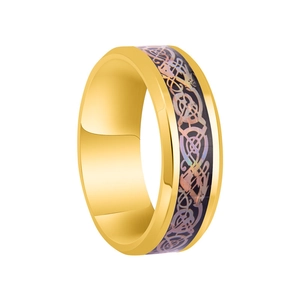 Close-up of golden dragon ring with purple celtic pattern inlay and polished edges
