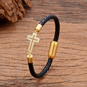 Handcrafted woven black leather bracelet with golden zircon cross and magnetic clasp