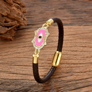 Bracelet tressé en cuir avec main de Fatma, œil protecteur et cristaux