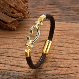 Men's handmade woven leather bracelet with gold-plated magnetic clasp and blue zircon